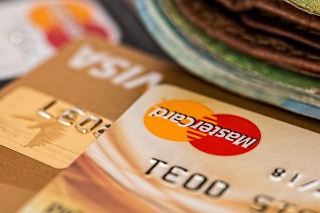 an image of some credit/debit cards - ways facilities management can save costs