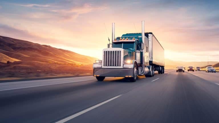 an image of a freight truck - sourcing and procurement, and logistics